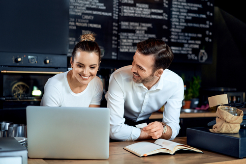 Retail owner reviewing business financing options